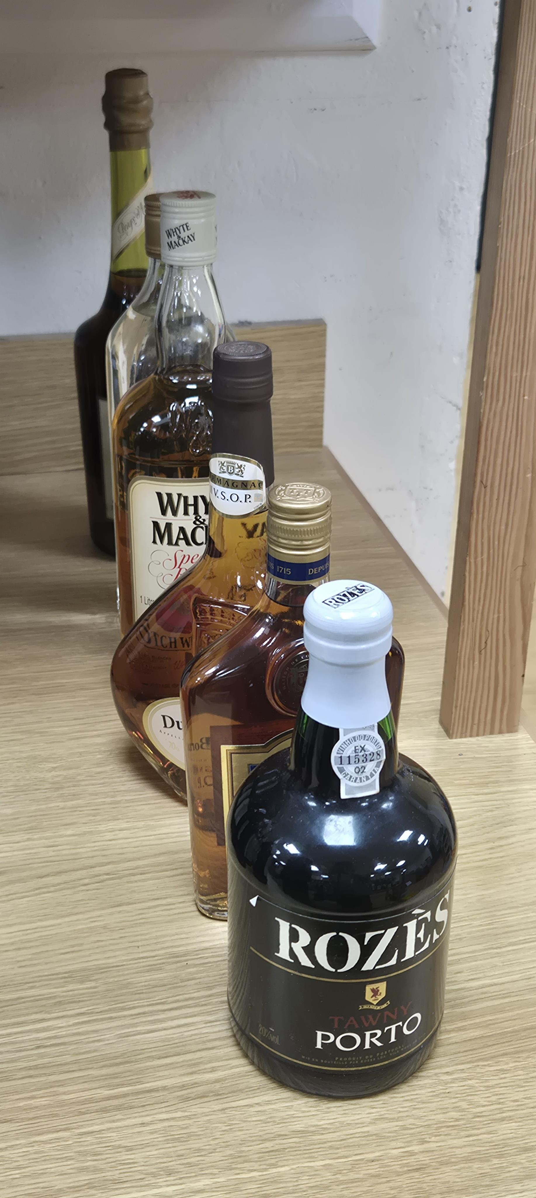 Six bottles of spirits, etc. including; Rozes tawny port, Calvados Boulard, Duc de Borzac Armagnac VSOP, etc.